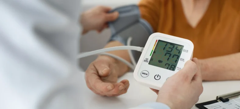 older-person-checking-their-blood-pressure-with-tensiometer